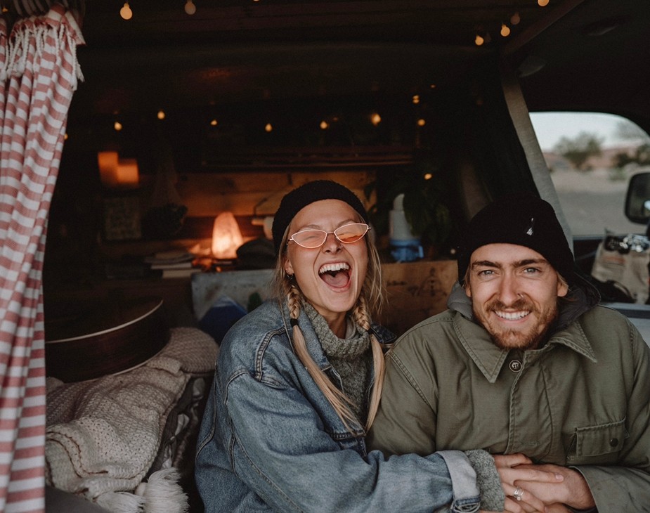 Nathaniel and Emily in the first van he built